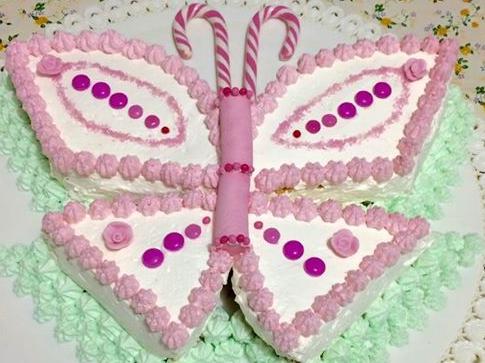torta farfalla (si divide in 4 pezzi il pandispagna e girandoli si crea la figura)